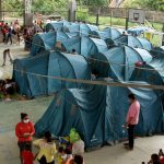 Cientos de venezolanos permanecen en refugios vigilados por las autoridades