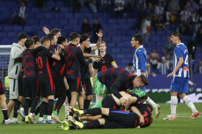 El club catalán se coronó a falta de dos jornadas para el final del campeonato. Fotos AP